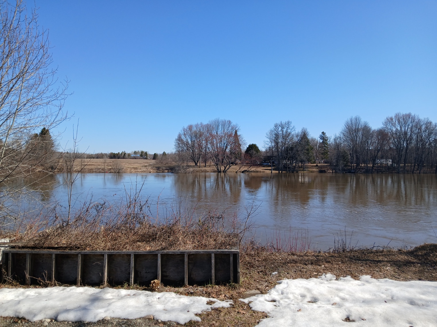 Spanish River corridor flood conditions — photo refreshed April 22, 2026.