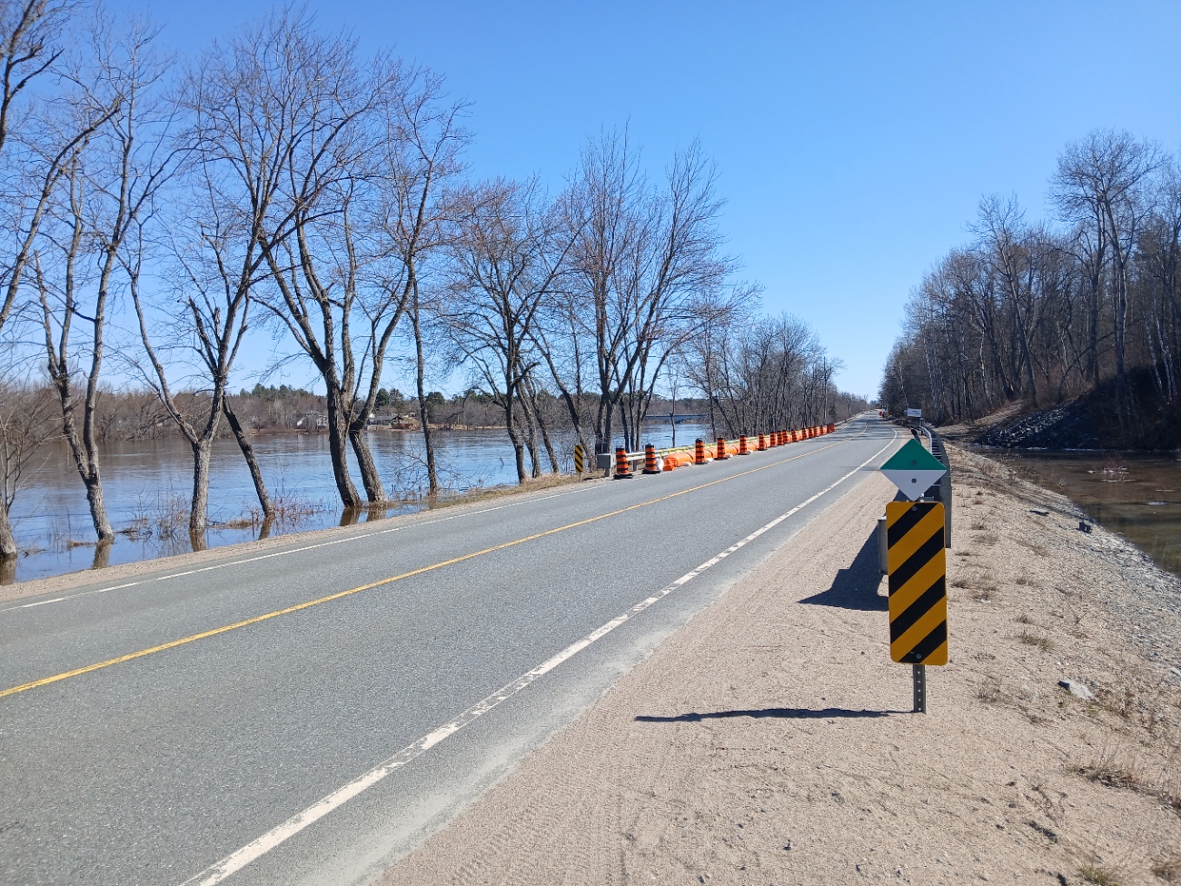 Flood conditions on territory — use caution near moving water; photo refreshed April 22, 2026.